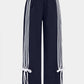 Multicolored 90s patchwork pants with bow detail 