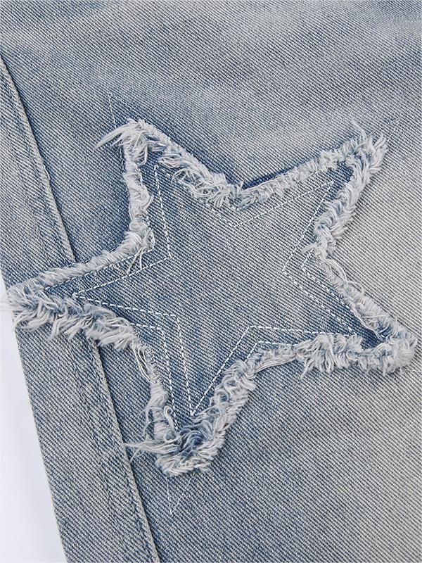 Faded vintage boyfriend jeans with star patch