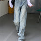 Faded vintage boyfriend jeans with star patch