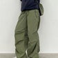 Green oversize parachute cargo pants with drawstring