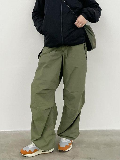 Green oversize parachute cargo pants with drawstring