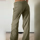 Green cargo trousers with straight legs and pockets