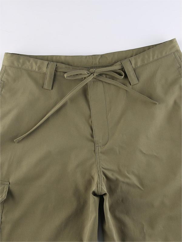 Green cargo trousers with straight legs and pockets