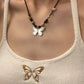 Vintage butterfly necklace with pearl stones