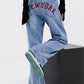 Baggy boyfriend jeans with an embroidered motif on the back