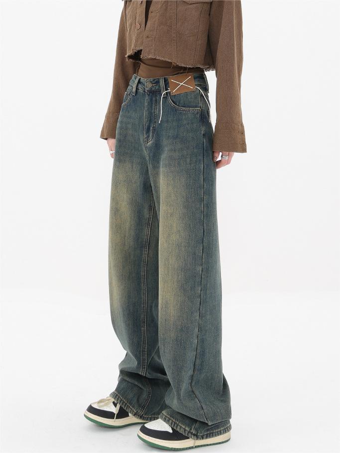 Vintage distressed baggy boyfriend jeans with cut pockets