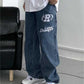 Hip hop straight leg baggy jeans with slogan 