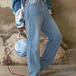 Blue vintage high rise boyfriend jeans with all over fringe design