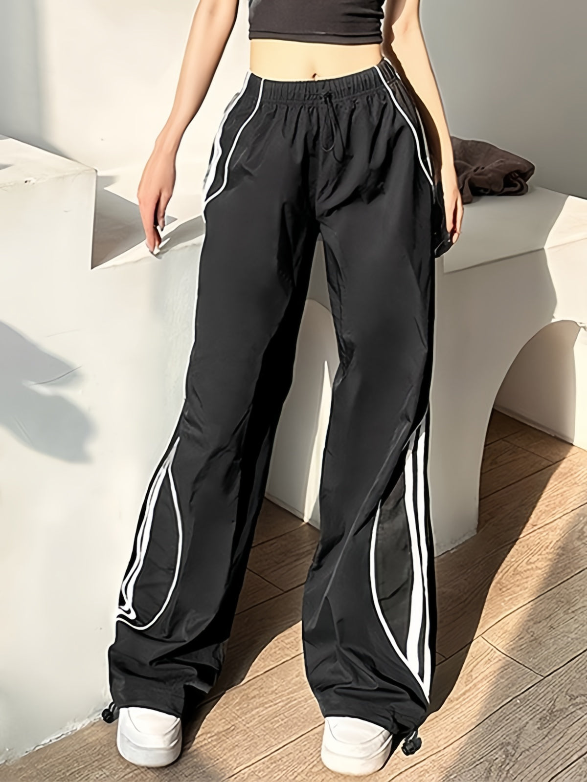 Retro sport black baggy jogging pants with side piping stripes