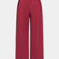 Multicolored 90s patchwork pants with bow detail 