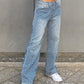 Blue vintage high rise boyfriend jeans with all over fringe design