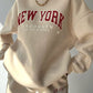 Vintage pullover sweatshirt with contrasting colors and letter print