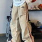 Men's cargo pants with pleated button details