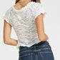 White French lace top with scoop neck and short sleeves