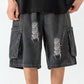 Dark grey vintage men's denim shorts with ripped pockets