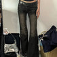 Dark vintage flared trousers with low waist and inserts