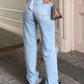 Light blue 2000s Y2k boyfriend jeans with ripped design