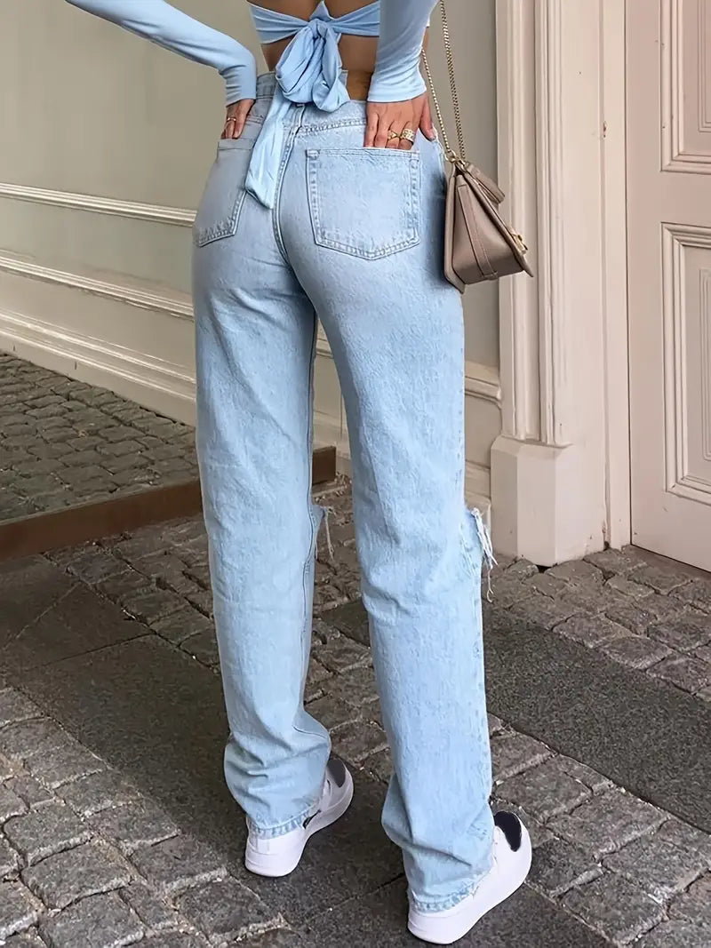 Light blue 2000s Y2k boyfriend jeans with ripped design