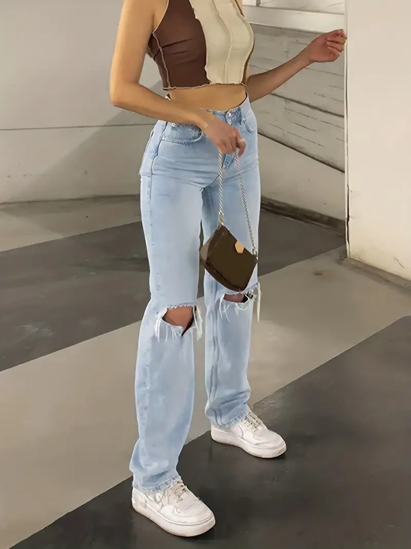 Light blue 2000s Y2k boyfriend jeans with ripped design