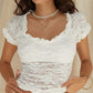 White French lace top with scoop neck and short sleeves