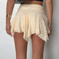 Cute structured pleated mini skirt with irregular mushroom hem and high waist