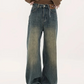 Vintage distressed baggy boyfriend jeans with cut pockets