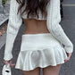 White vintage ruffle mini skirts with pearl buckle