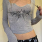 Grey vintage cropped long-sleeved shirt with neckline and star print