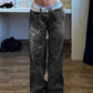 Y2K black cargo jeans with washed effect and heart print