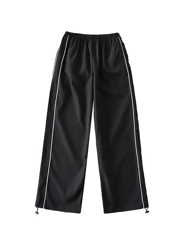 Black baggy sweatpants with piping detail