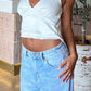Paola top in ivory with floral details satin