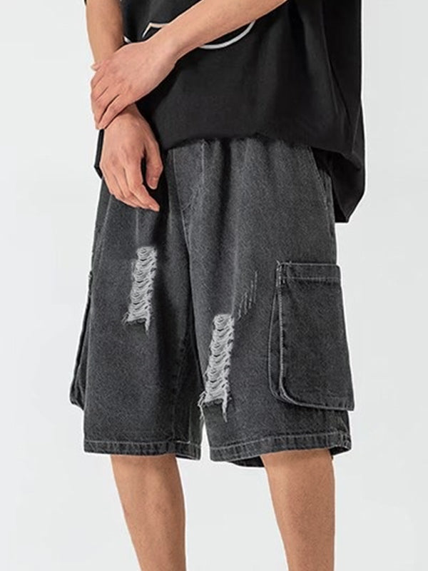 Dark grey vintage men's denim shorts with ripped pockets