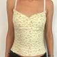 Yellow Y2K ruffle crop top with floral print