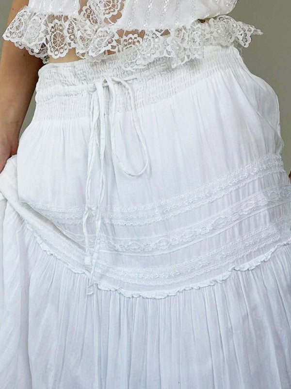 White vintage maxi skirts with lace trim and straps