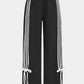 Multicolored 90s patchwork pants with bow detail 