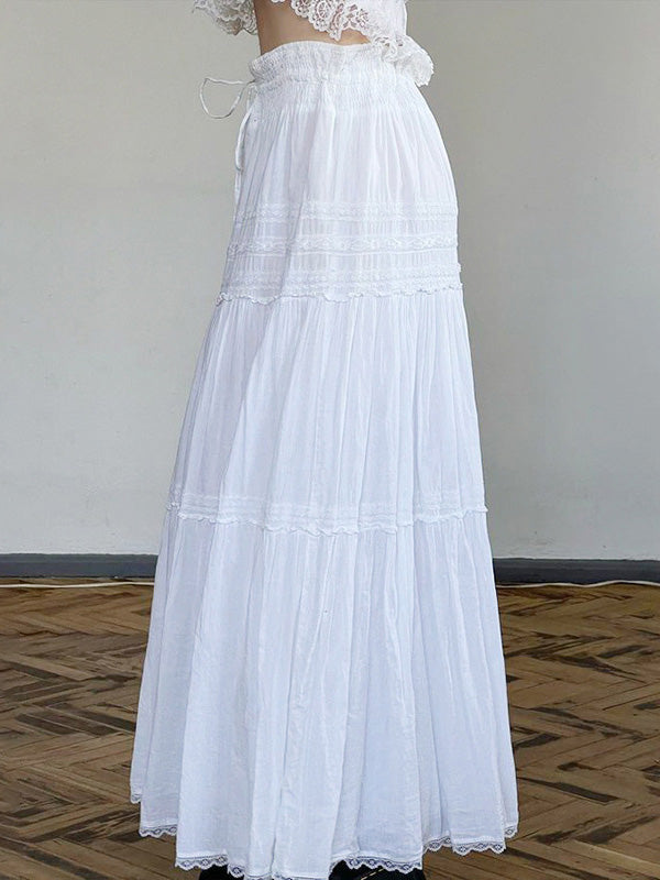 White vintage maxi skirts with lace trim and straps