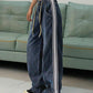 Faded boyfriend jeans with splice piping and drawstring