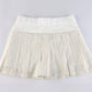 White Y2k pleated mini skirt with lace