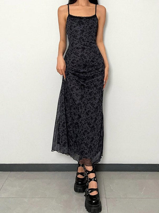 Black vintage maxi dress with generous neckline and slim fit