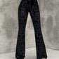 Black vintage flared trousers with embossed velvet and flared legs