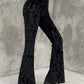 Black vintage flared trousers with embossed velvet and flared legs