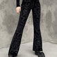 Black vintage flared trousers with embossed velvet and flared legs