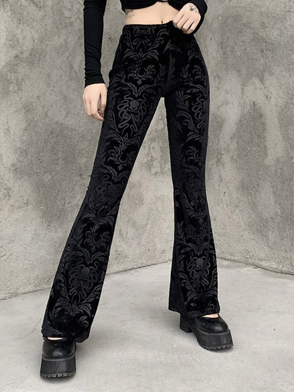 Black vintage flared trousers with embossed velvet and flared legs