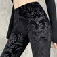 Black vintage flared trousers with embossed velvet and flared legs