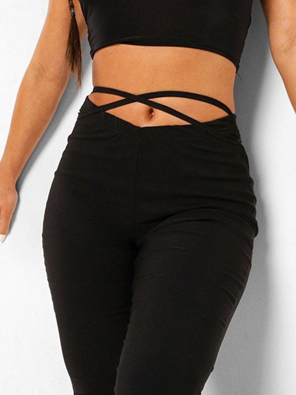 Black flared trousers with V-shaped lacing