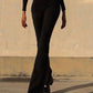 Black flared trousers with V-shaped lacing