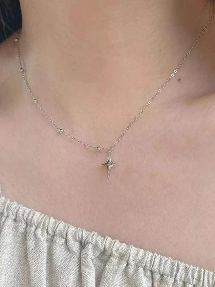 Vintage asymmetric necklace with star pendant