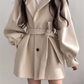 Coat with lapel collar, puff sleeves and belt
