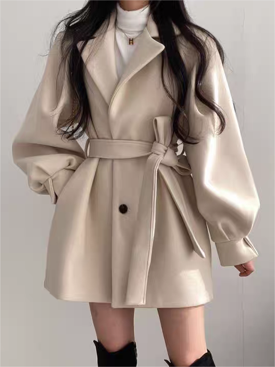 Coat with lapel collar, puff sleeves and belt