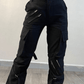 Black hip hop zip up cargo pants with strap details